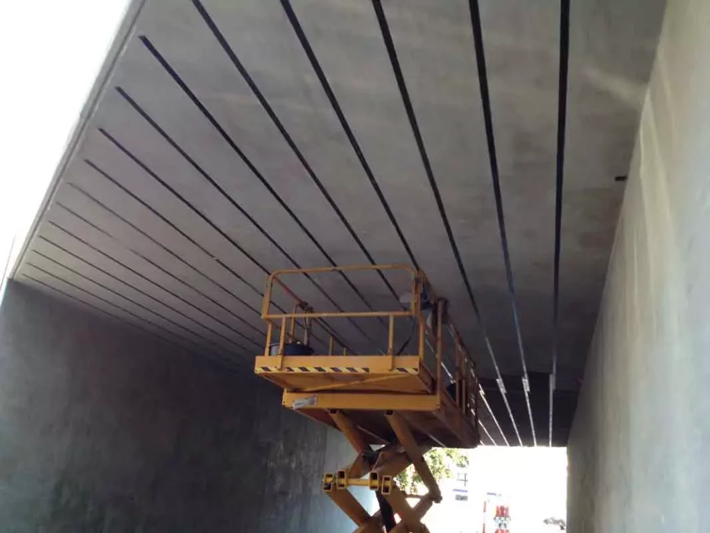 flexural-strengthening-of-concrete-bridge-deck-using-frp-laminate-AFZIR-CO1