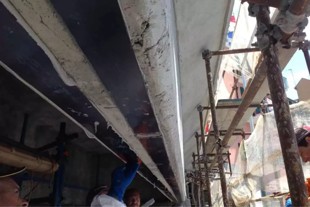 concrete-beam-repair-and-strengthening-using-frp-laminate-AFZIR-CO3