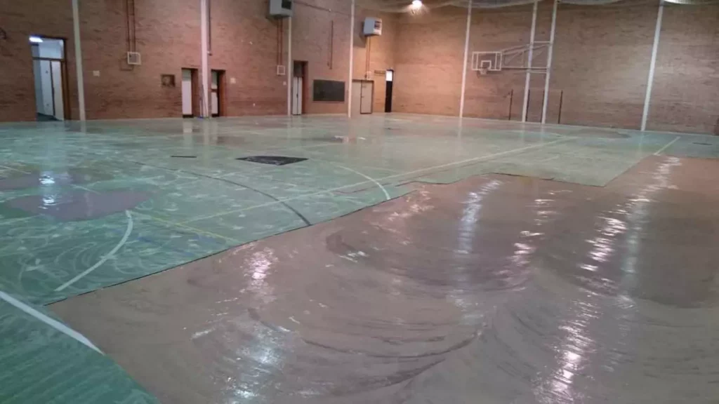 damaged-sport-complex-flooring-AFZIR-CO2-1400×788